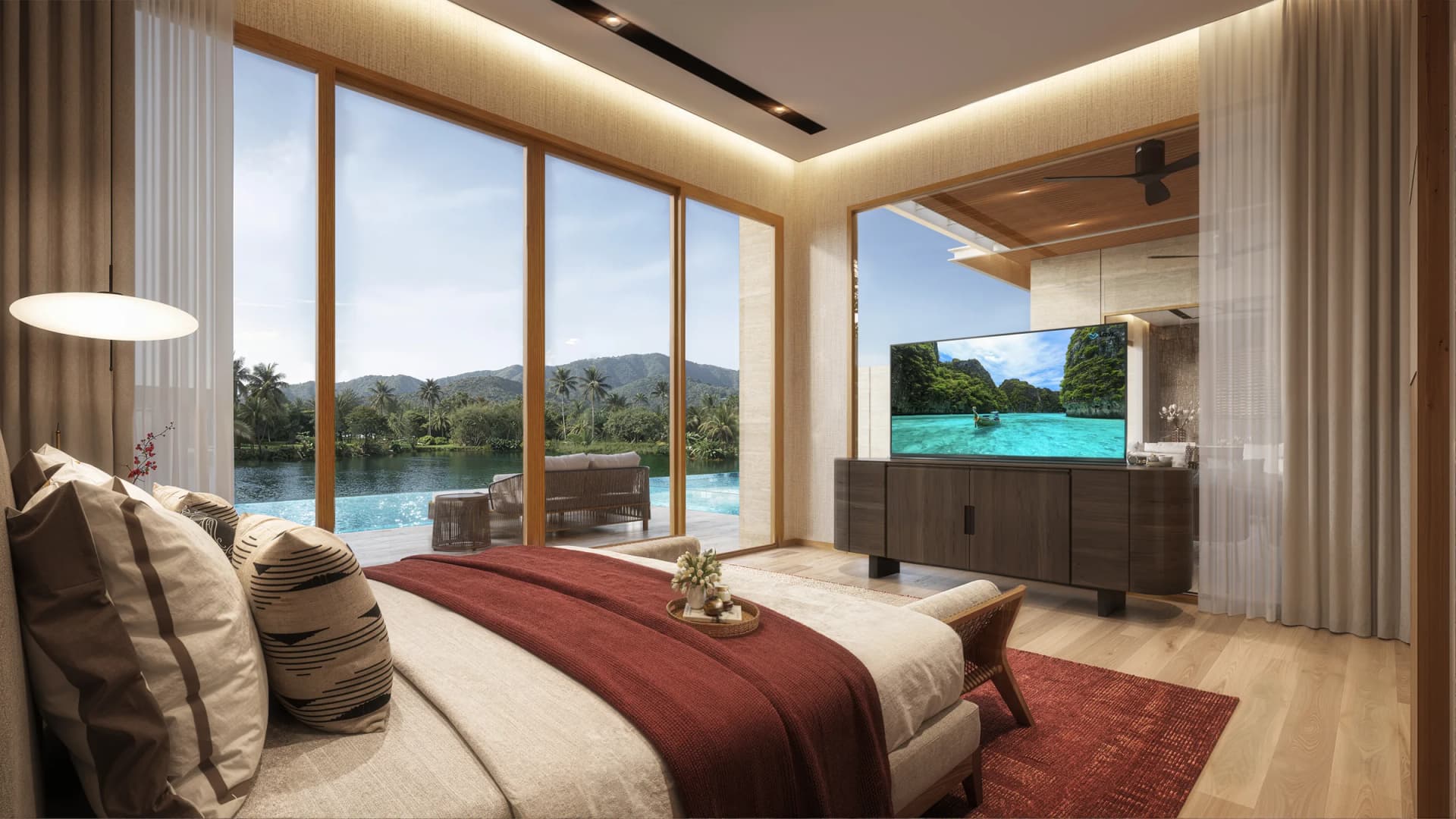 Yara collection: a master bedroom with floor-to-ceiling glass over the lagoon
